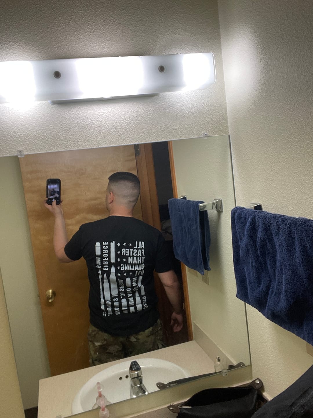 Customer photo review of All Faster Than Dialing 911 Tee