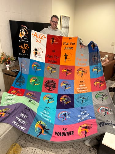 T-shirt quilt with running, volunteering themes by Jenny from NE