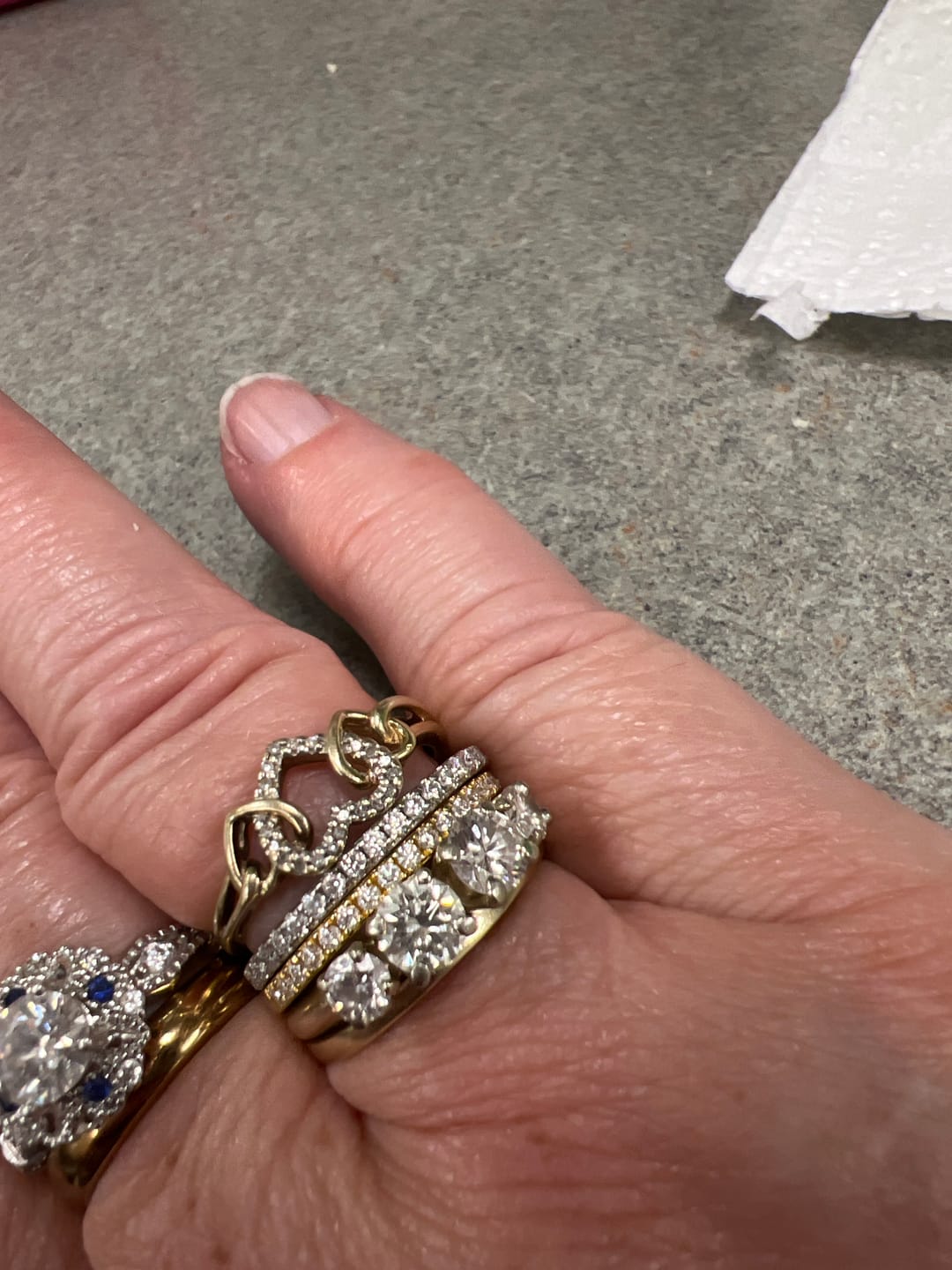 Customer photo review of Moissanite Round Half Eternity Sterling Silver Wedding Band Stackable Ring