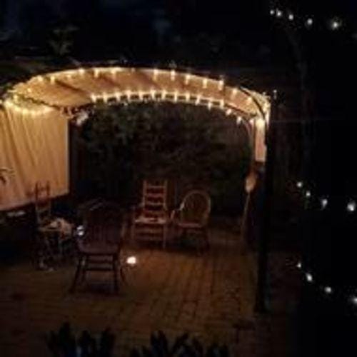 Customer photo review of SUNJOY Outdoor Patio 9.5x11 Modern Tan Metal Arched Pergola Kit with Adjustable Canopy