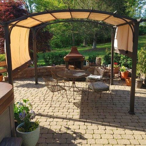 Customer photo review of SUNJOY Outdoor Patio 9.5x11 Modern Tan Metal Arched Pergola Kit with Adjustable Canopy
