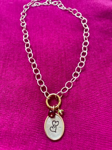 Customer photo review of Purple Garnet Faceted Rondelle Gemstone