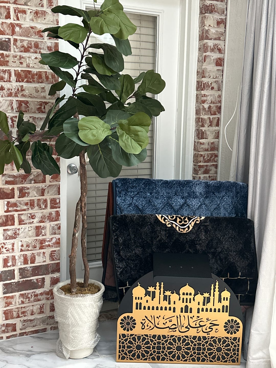 Customer photo review of Prayer Rug Holder - Wooden Prayer Mat Stand and Storage Ideas