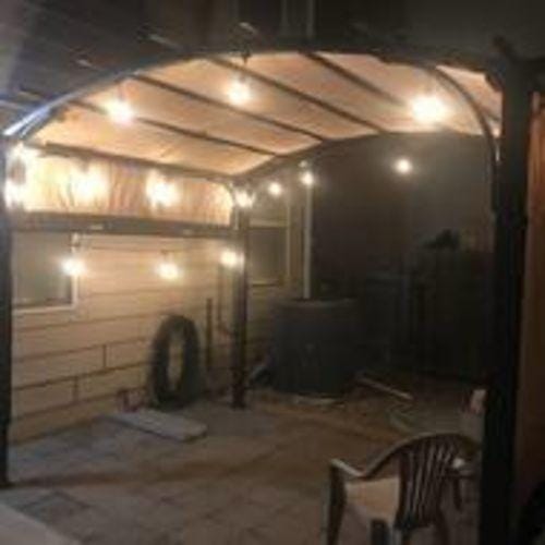 Customer photo review of SUNJOY Outdoor Patio 9.5x11 Modern Tan Metal Arched Pergola Kit with Adjustable Canopy
