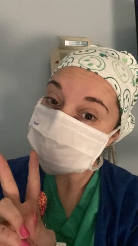 Customer photo review of Scrub Hat - Smiley Shamrock