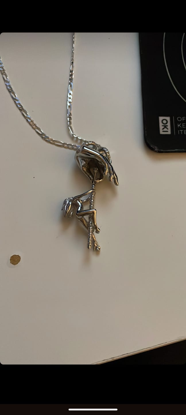Customer photo review of DANCING WITH DEATH PENDANT