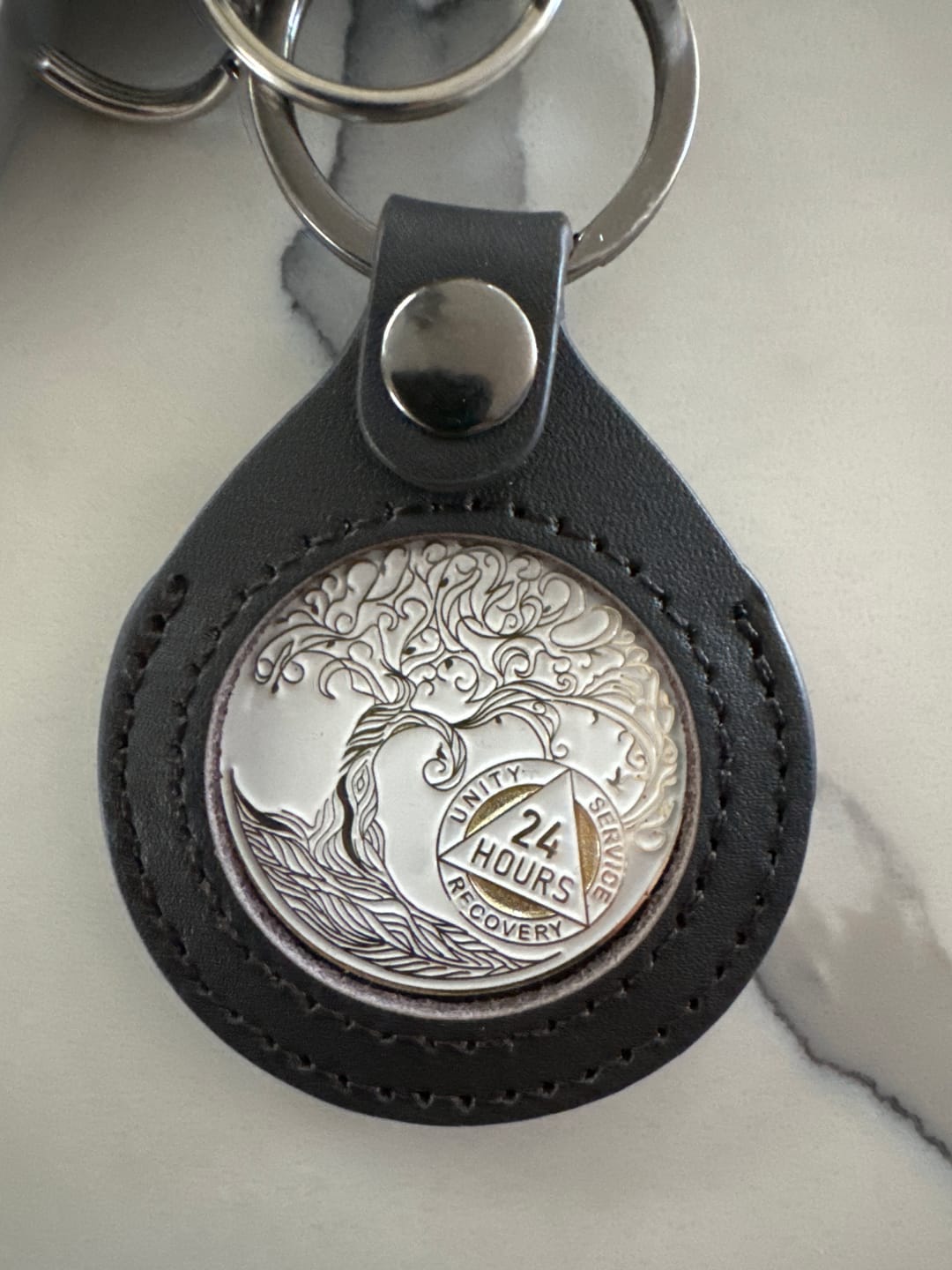 Customer photo review of 24 Hours Sobriety Mint Twisted Tree of Life Gold Plated AA Recovery Medallion - Twenty-Four Hours Chip/Coin - White