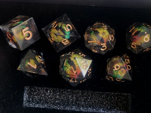 Customer photo review of D&D Floating Dragon's Eye Liquid Heart Resin Engraved Dice Set