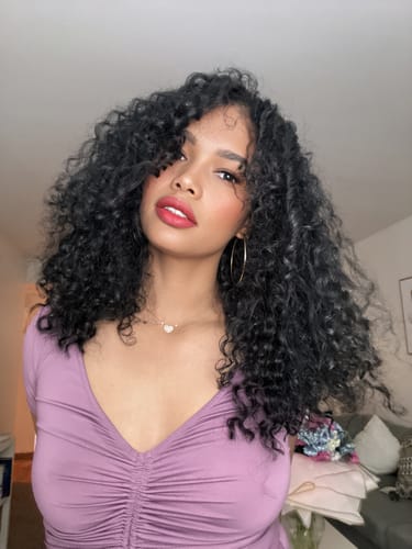 Customer photo review of Jet Black Curly Clip-In Hair Extensions