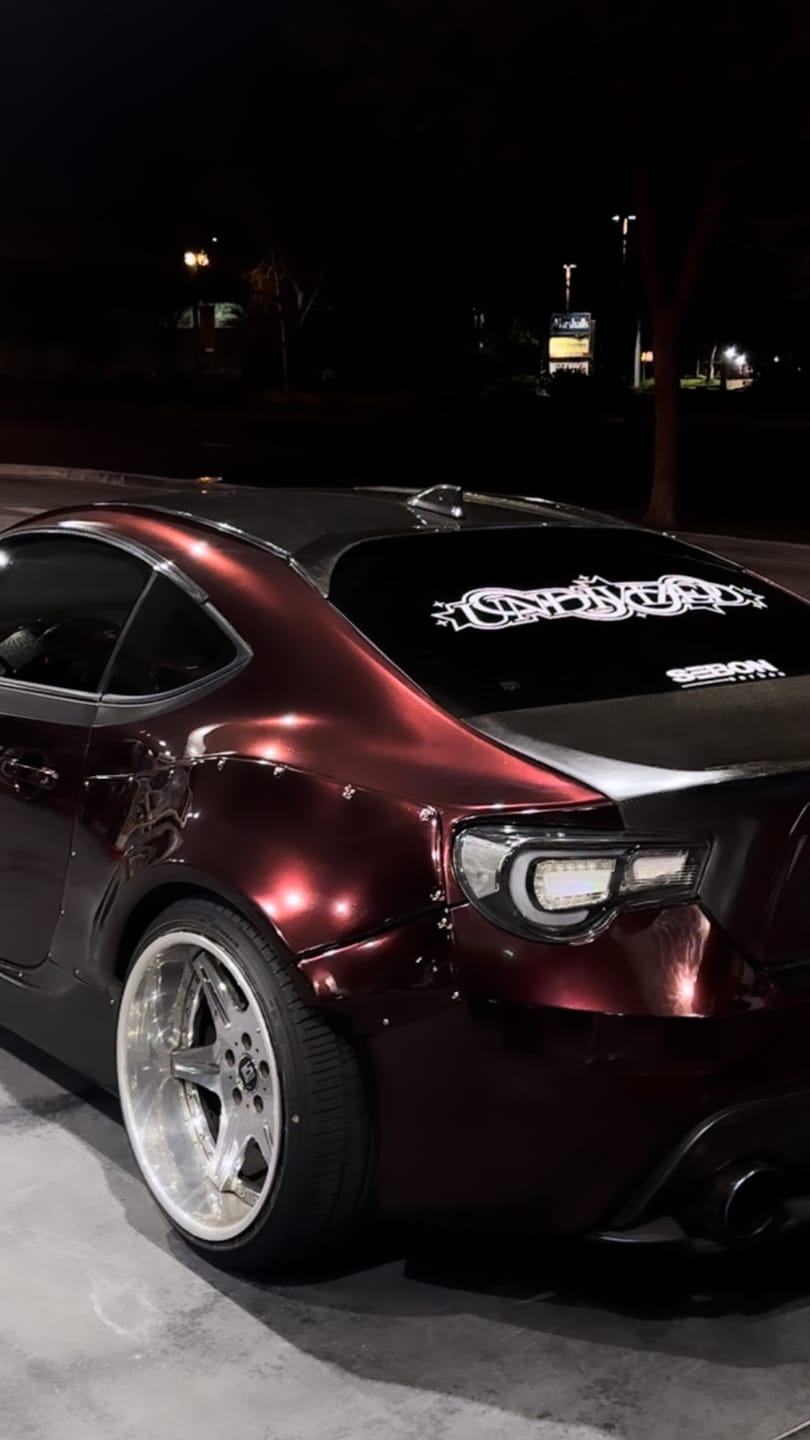 Customer photo review of Glossy Metallic Black Rose Vinyl Wrap