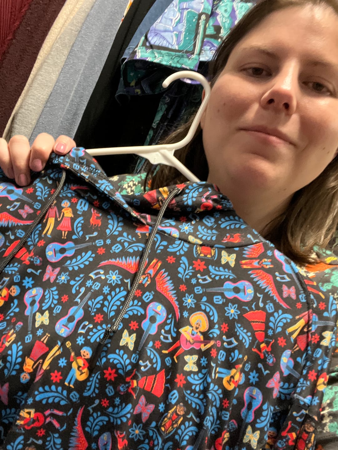 Customer photo review of Disney and Pixar Coco "Music In Me" – Performance Hoodie