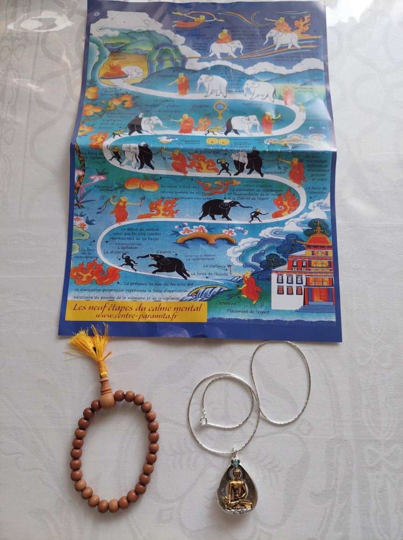 Customer photo review of Amulettes Bouddha +🎁