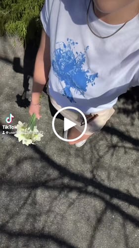 Customer video review of 'From the Garden' baby tee