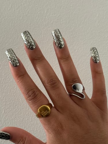 Customer photo review of Steel Waves Ring