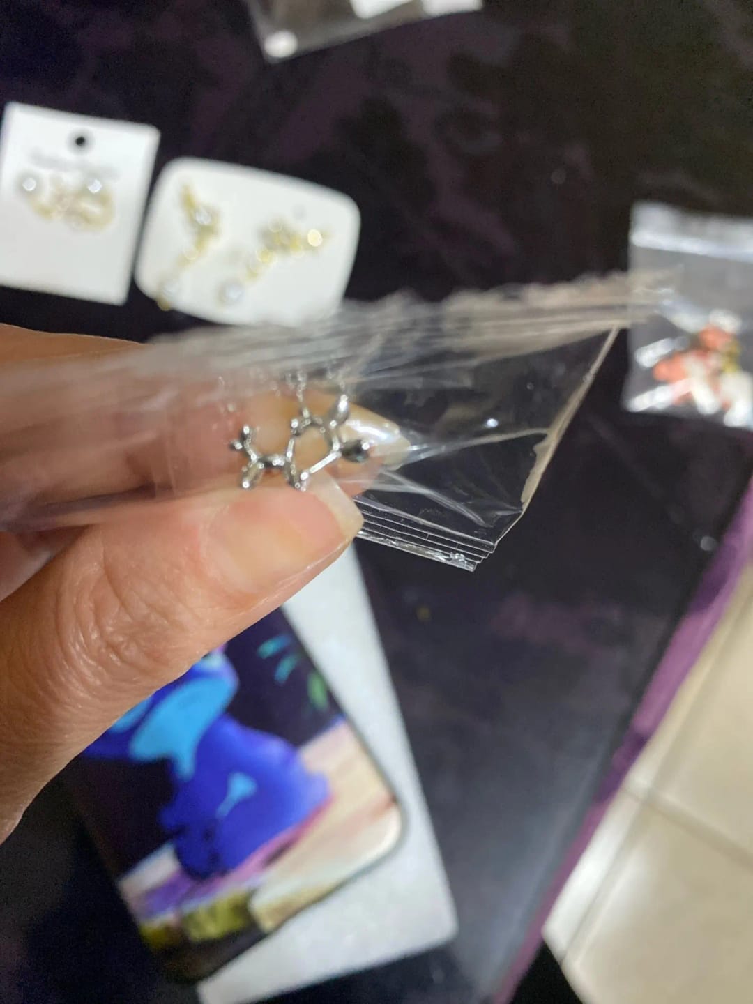 Customer photo review of Sterling Silver Balloon Dog Earrings