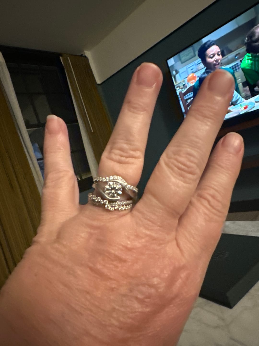Customer photo review of Curved Pave Moissanite Half Eternity Wedding Band Stackable Ring