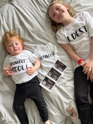 Customer photo review of Oldest/Youngest/Middle Sibling Announcement White T-Shirts/Bodysuit