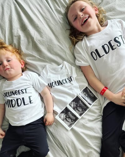 Customer photo review of Oldest/Youngest/Middle Sibling Announcement White T-Shirts/Bodysuit