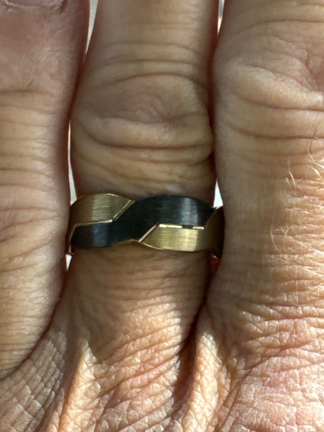 Customer photo review of Tungsten Black and Gold Infinity Knot Ring, Tungsten Rings for Men Wedding Band