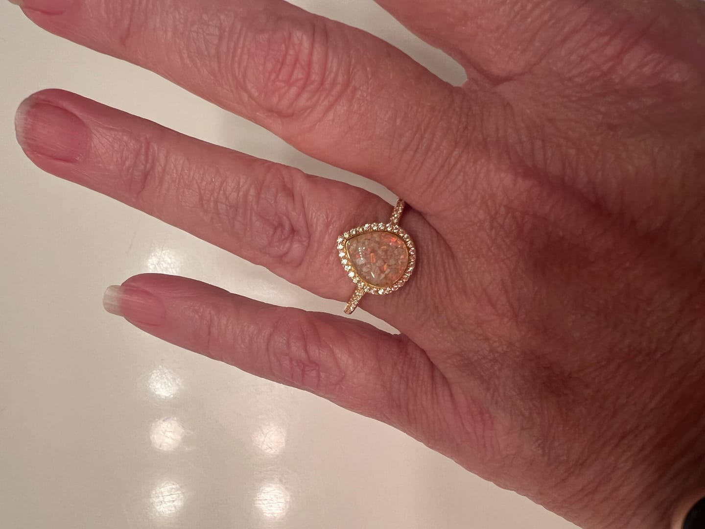 Customer photo review of Bedazzled Pear Opal Ring with Cremation Ashes
