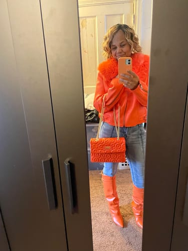 Customer photo review of Alyona Orange Faux Fur Leather Jacket