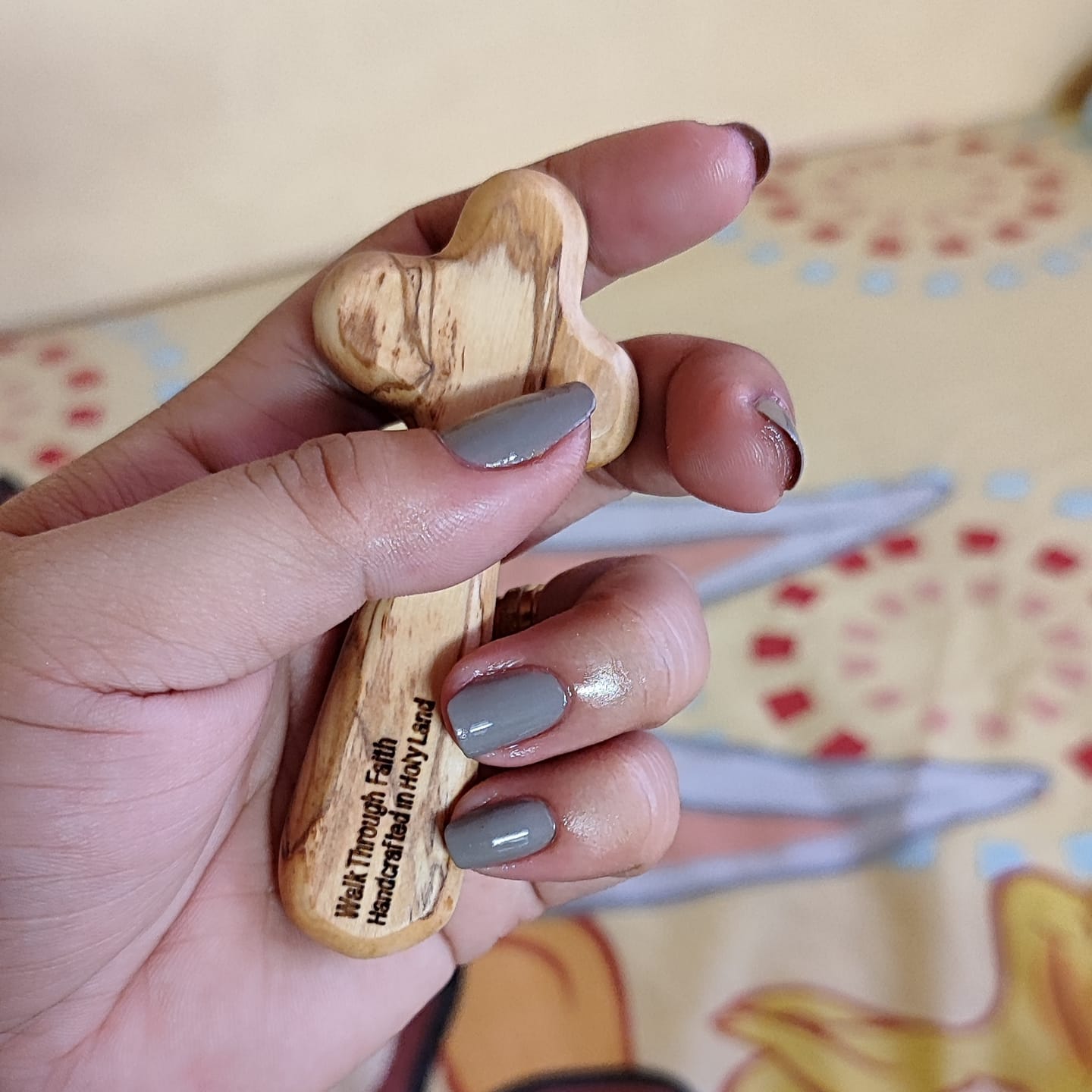 Customer photo review of Holy Land Olive Wood Comfort Cross