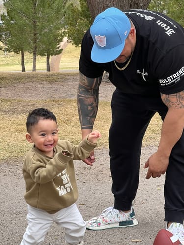 Customer photo review of Iron Sharpens Iron Oversized Tee