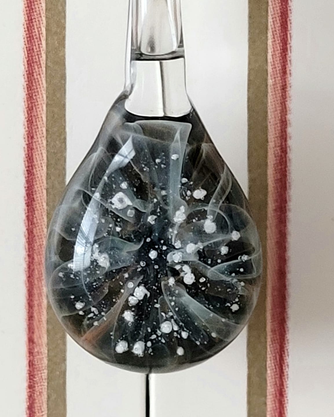 Customer photo review of Ghost Pendant with Infused Cremation Ashes
