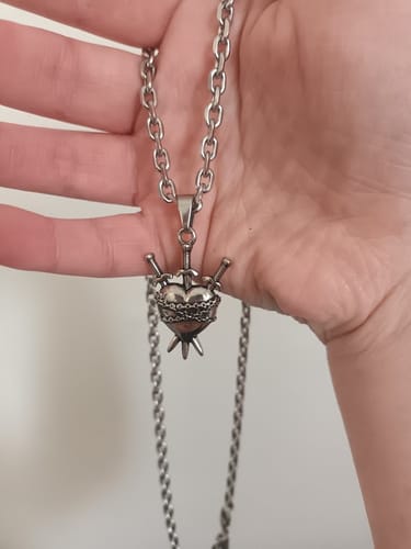 Customer photo review of "3 of Swords" Tarot Pendant Necklace