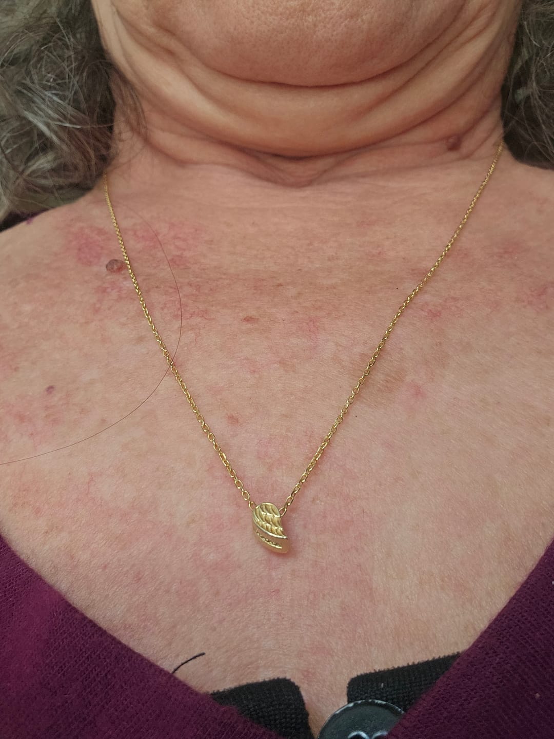 Customer photo review of always near angel wing necklace