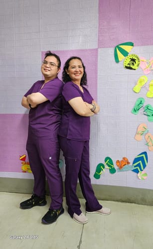 Customer photo review of 3-Pocket MoveTech® Scrub Top 2.0 - Men / Plum