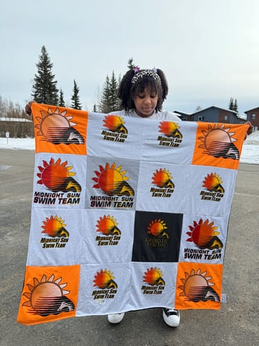 T-shirt quilt featuring midnight sun swim team by Jaunelle from AK