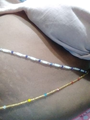 Customer photo review of Blue Glow in the Dark Waist Beads