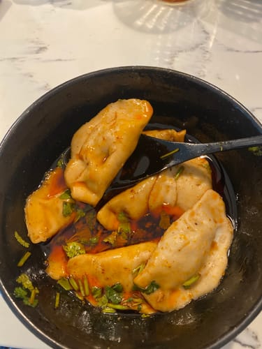 Customer photo review of Frozen [F4] Lamb Dumplings w/ Spicy & Sour Sauces (30 Pieces/5 Servings)