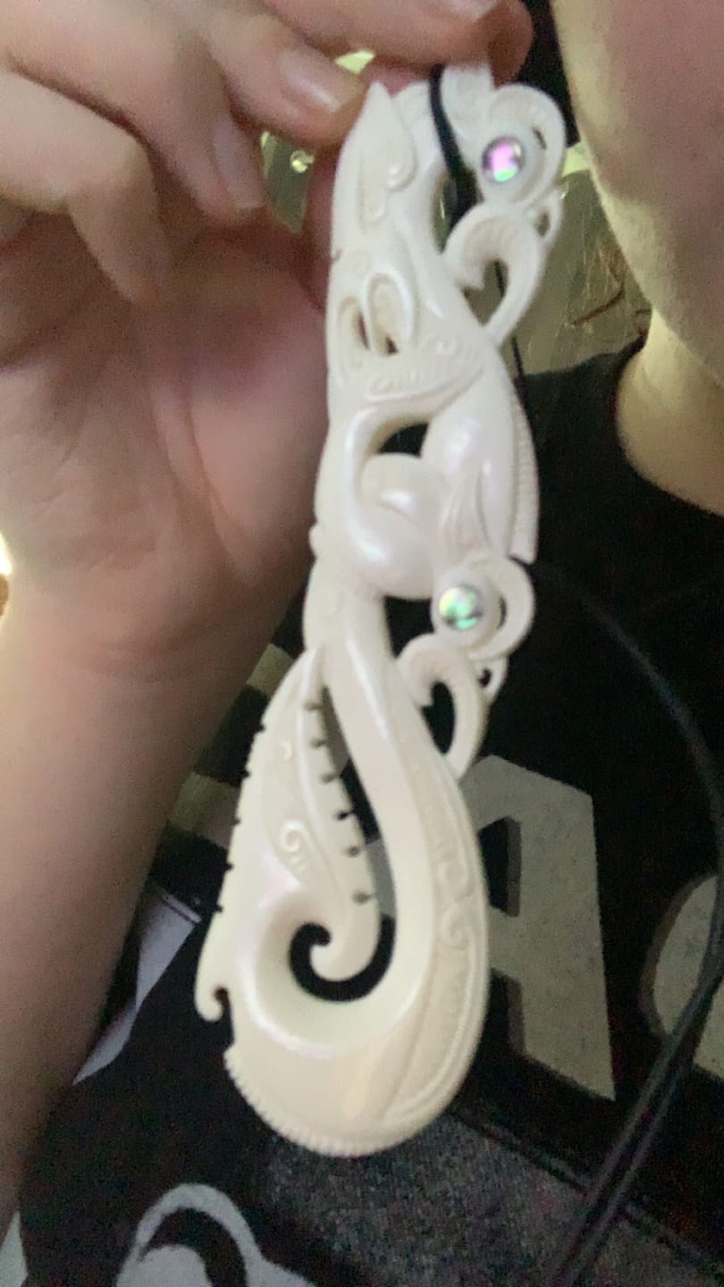 Customer photo review of Intricately Carved 12.5cm Maori Bone Manaia Necklace