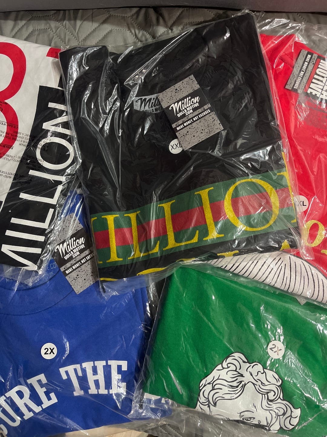 Customer photo review of Mystery Box of 12 T-Shirts