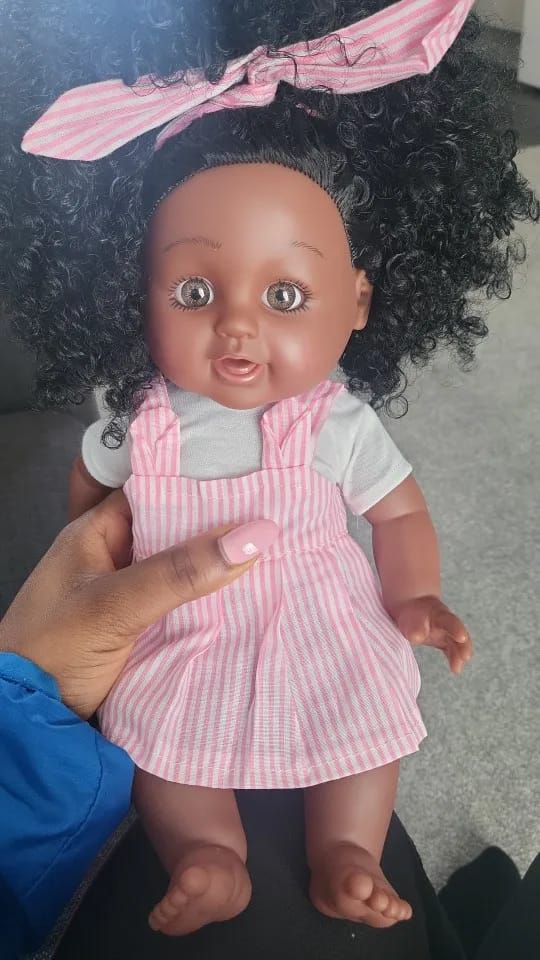 Customer photo review of Poupee Africain