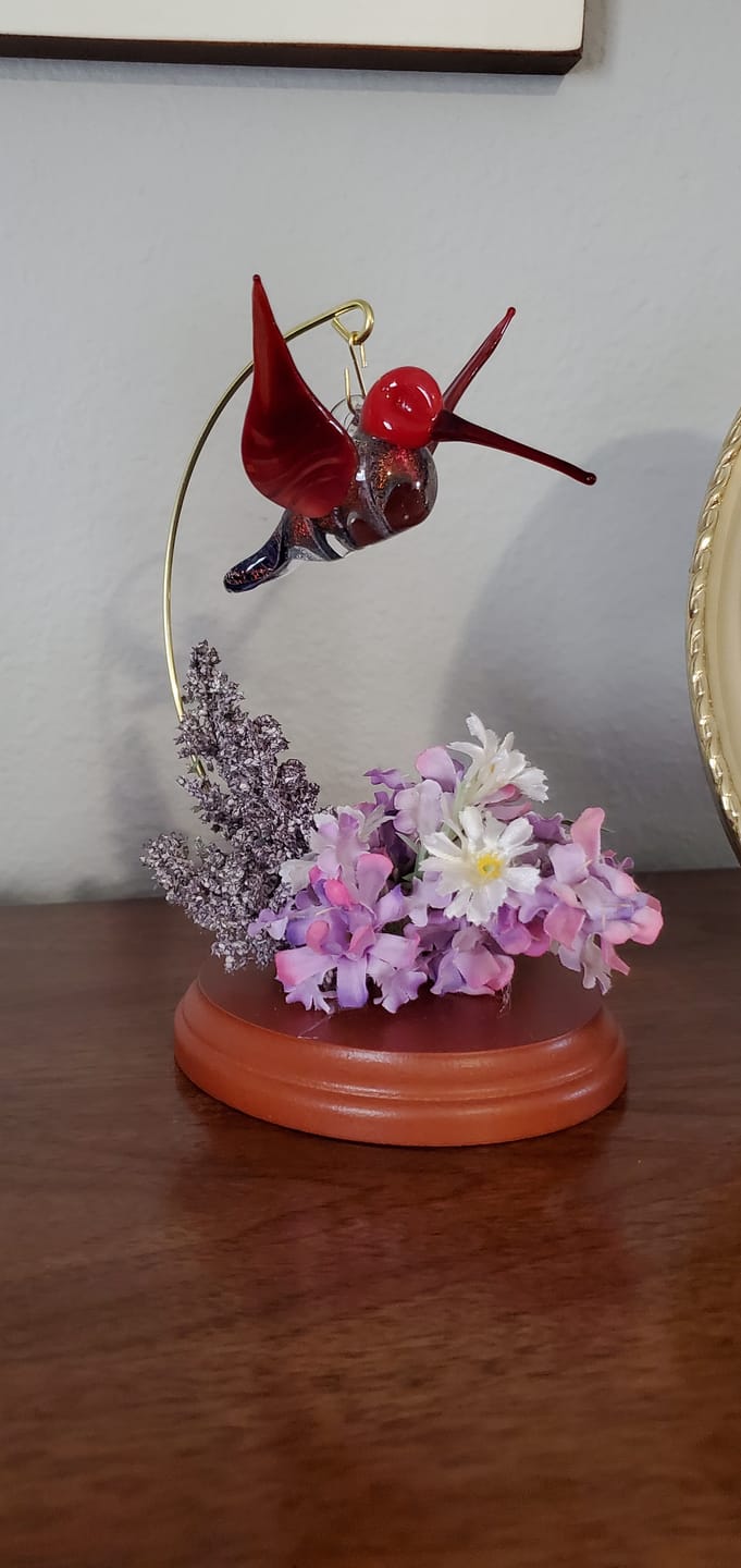 Customer photo review of Red Dichroic Twist Glass Hummingbird with Infused Ash