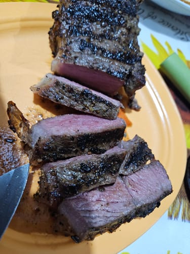 Reseña con foto de un cliente sobre New York Steak