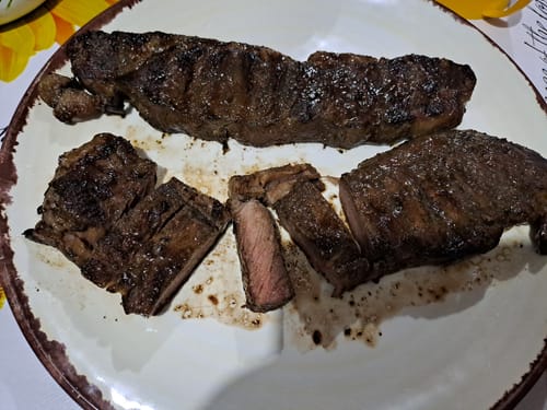 Reseña con foto de un cliente sobre Tablita de lomo