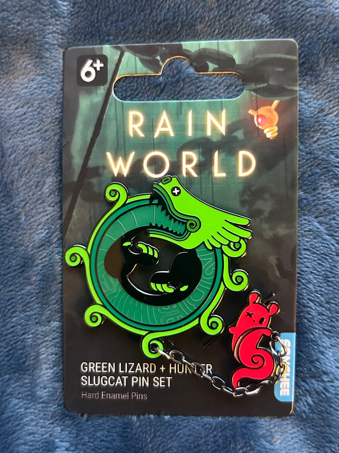 Customer photo review of Rain World - Green Lizard Hanger Pin