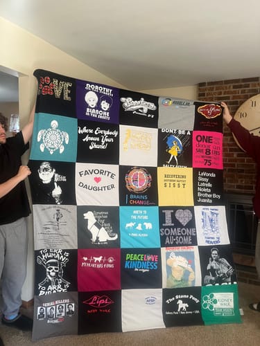 T-shirt quilt with tv shows, family themes by Barbara from NJ