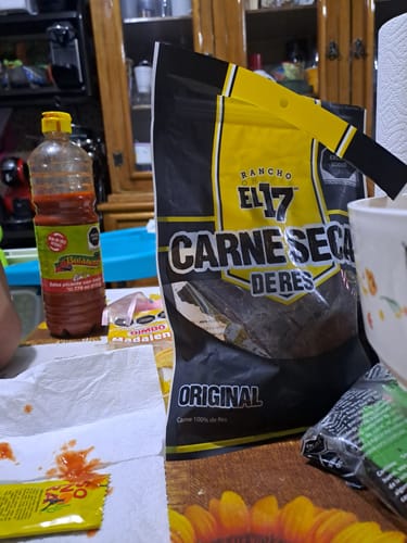 Reseña con foto de un cliente sobre Carne Seca Original