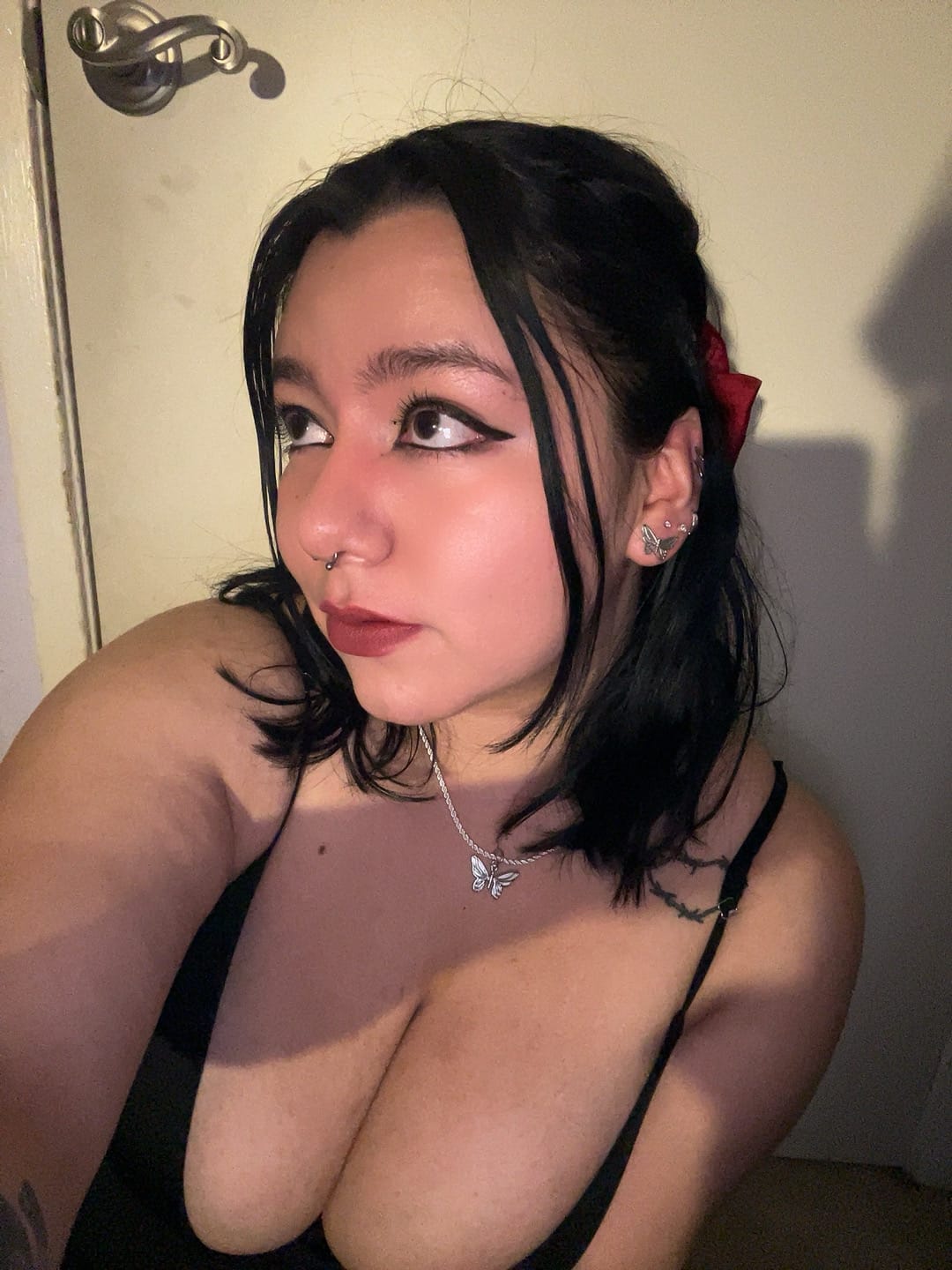 Customer photo review of BUTTERFLY EARRING (STUD)