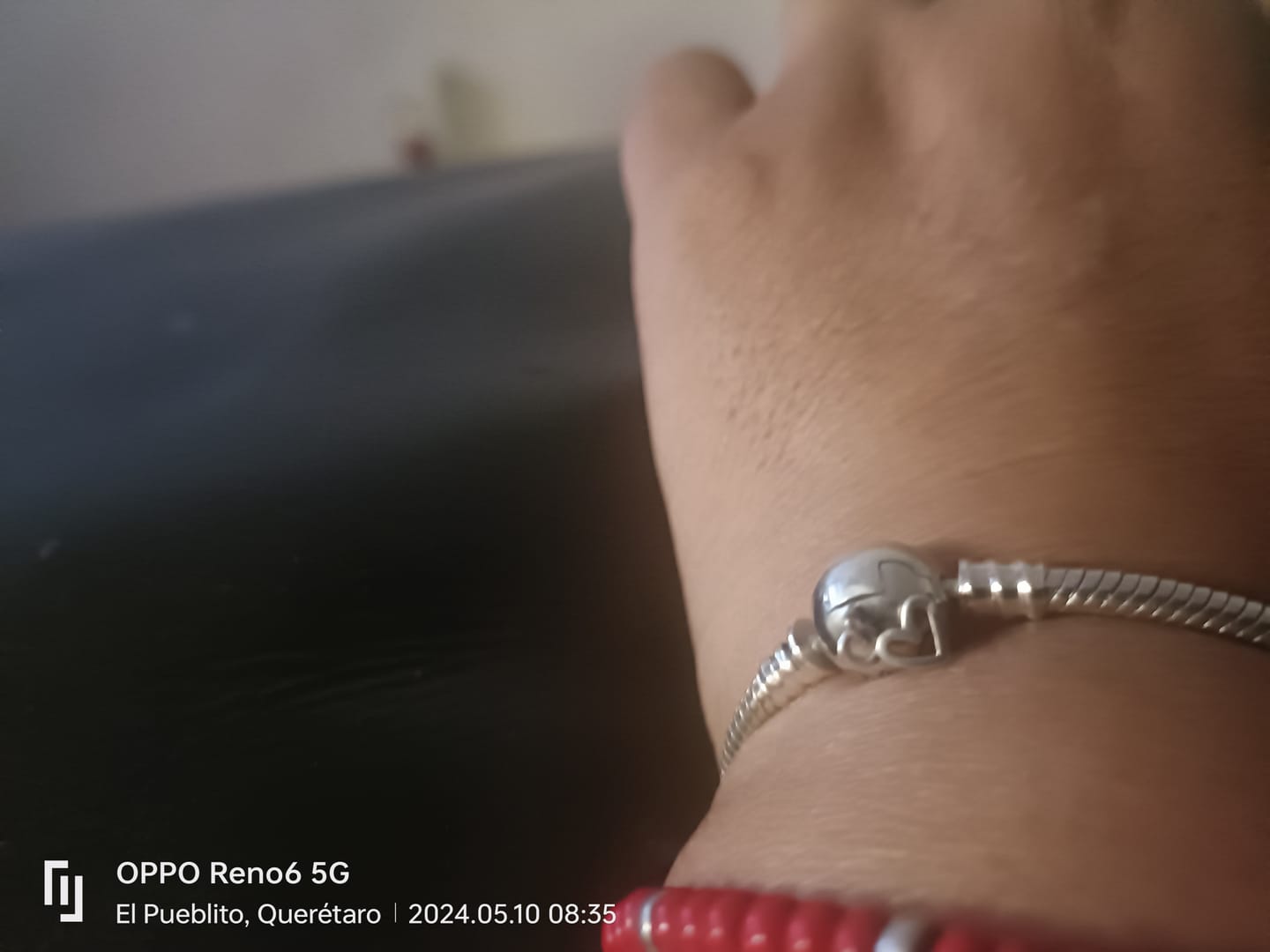 Customer photo review of Pulsera Esfera del Amor