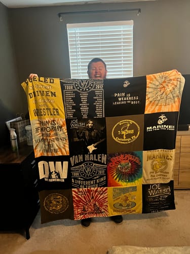 T-shirt quilt with music, wrestling themes by Candace from TN