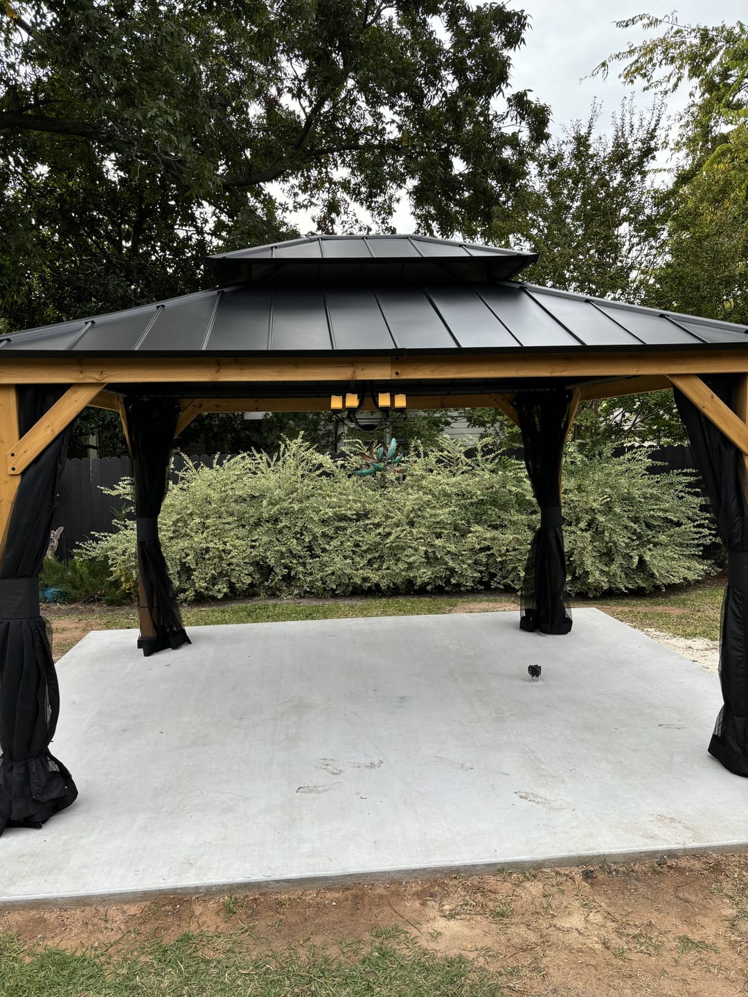 Customer photo review of SUNJOY 12x16 Outdoor Cedar Framed Gazebo with 2-tier Metal Roof and Ceiling Hook - Standard Natural Cedar