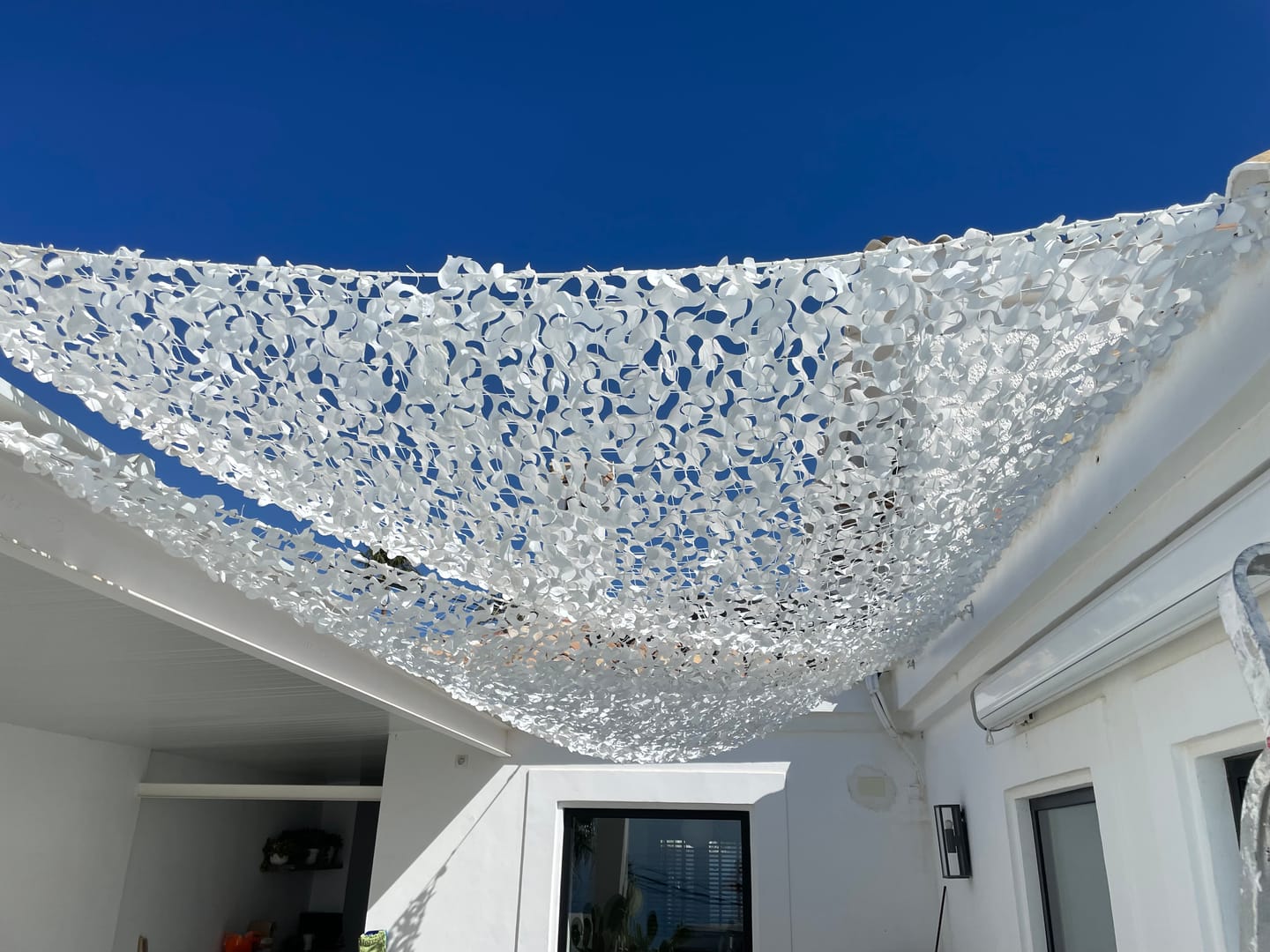 Customer photo review of Filet de camouflage triangulaire blanc