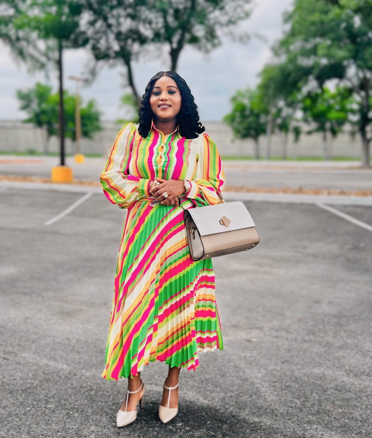 Customer photo review of BOLD TULIP PRINTED PLEATED MIDI DRESS (Multicolor)