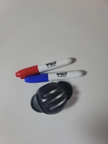 Customer photo review of SharpShot Golf Ball Line Liner: Precision Alignment Tool